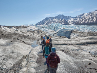 A tour group walks on the Matanuska Glacier on May 28th, 2022.