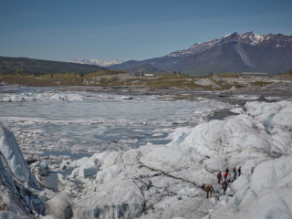 A tour group walks on the Matanuska Glacier on May 28th, 2022.