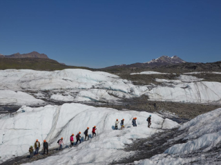 A tour group walks on the Matanuska Glacier on May 28th, 2022.